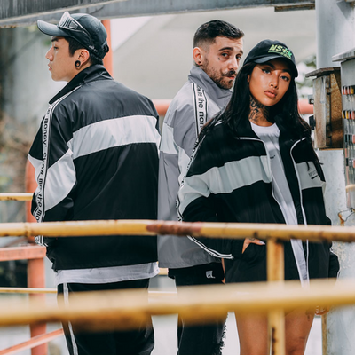 Veste Japonaise Yankee noire et grise en coton de marque japonaise Gotei porté par trois mannequins Japonais (une femme et deux hommes)