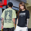 T-Shirt Motif Japonais noir et vert de marque japonaise Gotei porté par deux mannequins Japonais (un homme japonais et une femme japonaise)